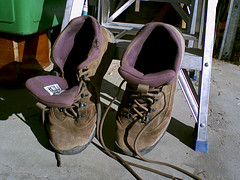 Brown hiking boots under the sun light